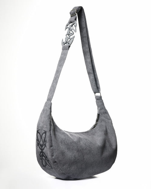 Gray shoulder bag with a brand logo on a white background