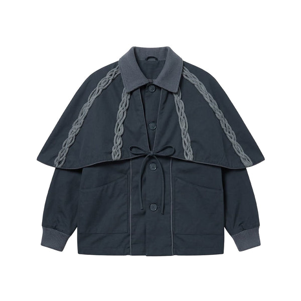 Dark blue jacket with chain details on a white background
