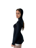 Woman wearing a black hooded top on a white background