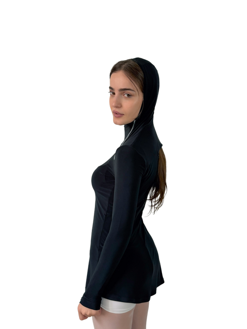Woman wearing a black hooded top on a white background