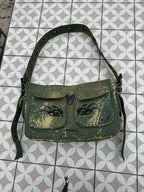 green bag on tiles