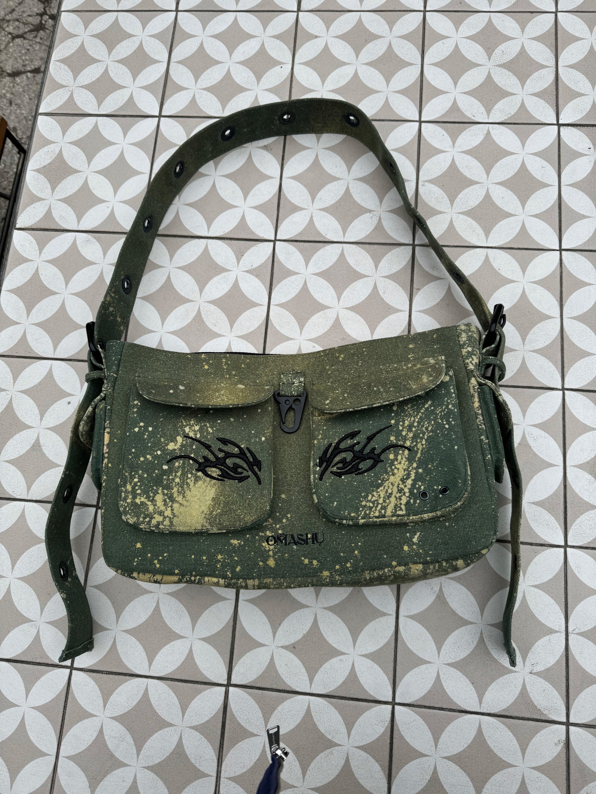 green bag on tiles