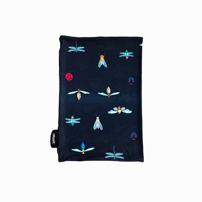 A rectangular fabric displaying a pattern of colorful insects, including dragonflies, ladybugs, and beetles, on a dark background. The design is playful and vibrant, with the insects arranged in a scattered pattern.