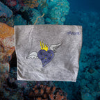 a folded t-shirt with gray heart and brand name Omashu
