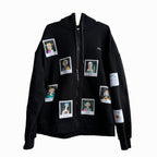 Black hoodie with multiple patches on it. The patches are of different sizes and shapes and are scattered all over the hoodie. The patches are of different colors and have different designs on them. Some of the patches have text on them, such as ‘WRATH’, ‘ENVY’, and ‘SLOTH’
